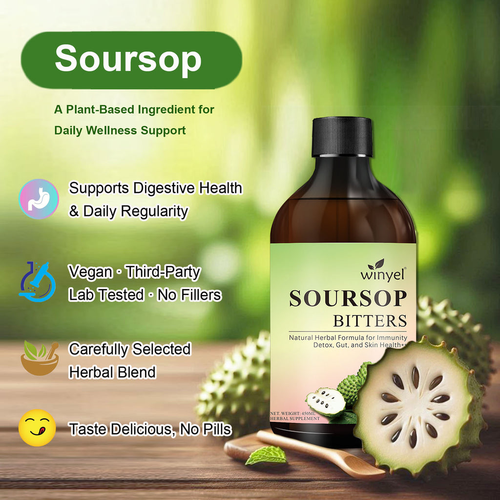 Soursop bitters bottle with soursop fruit on a wooden surface, green blurred background